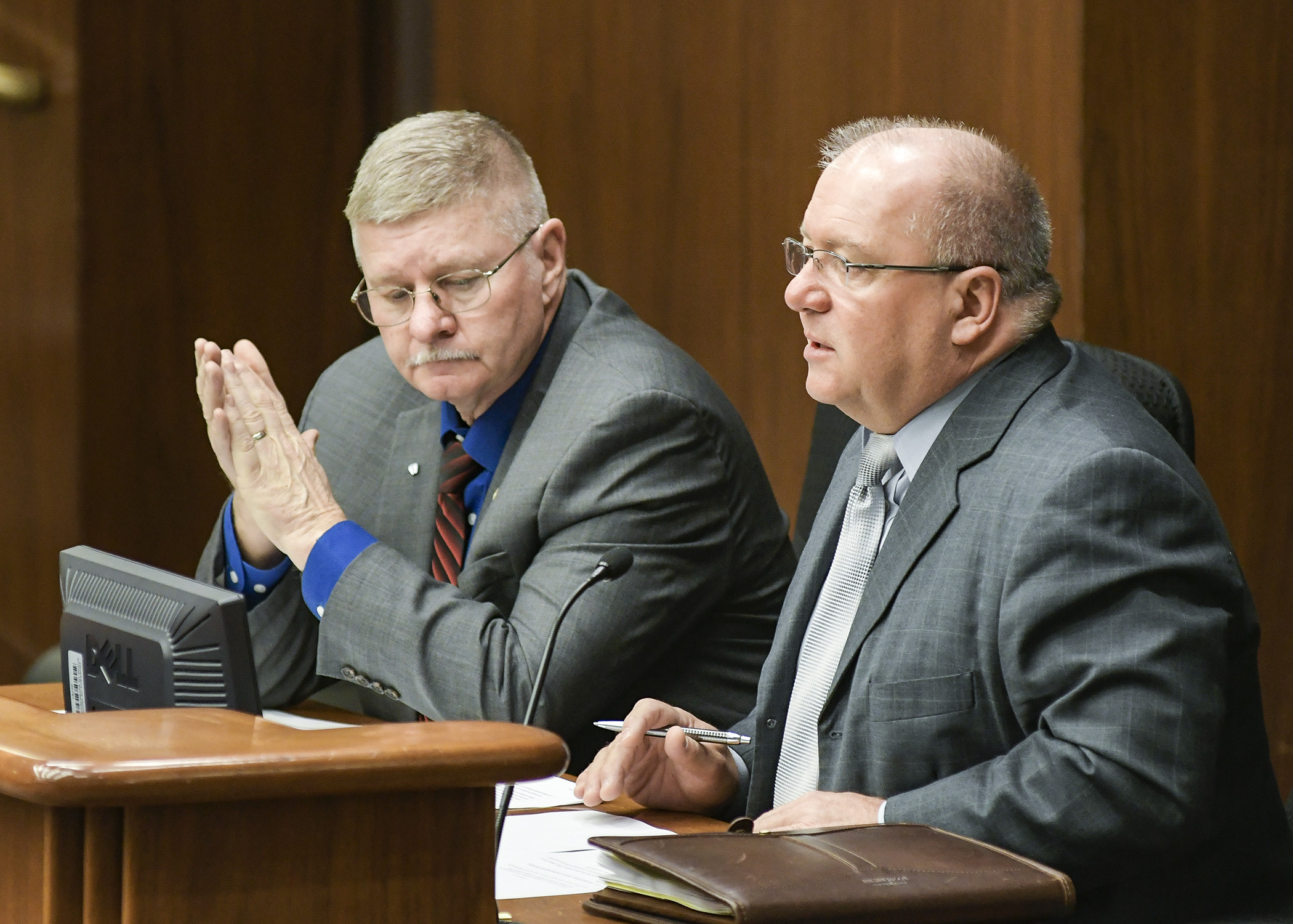 DNR Assistant Commissioner Bob Meier testifies before the House Environment and Natural Resources Policy and Finance Committee March 15 on a bill sponsored by Rep. Dale Lueck, left, meant to help trail construction. Photo by Andrew VonBank